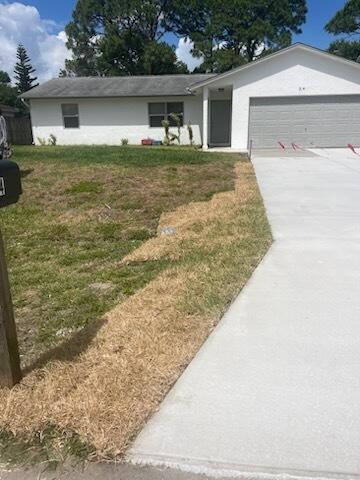 This charming three-bedroom, two-bathroom home blends comfort and style effortlessly. Upon entering, you're welcomed by the flowing tile flooring that extends throughout the house, leading to a spacious and inviting living area. Step outside onto the patio that overlooks a backyard, offering the perfect setting for outdoor living and dining. In May of this year, a new driveway was installed, providing ample parking space. A new air conditioning unit was installed in September 2021, and a thorough system clean out completed in August 2024, ensuring optimal performance and energy efficiency. As a bonus, a new refrigerator was added in December 2023. Don't miss the opportunity to make this property your own. Tenant occupied - schedule a viewing with listing agent.