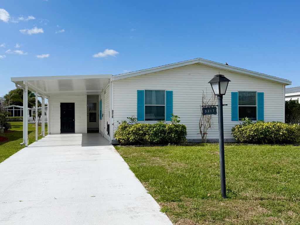 Photo of 3317 Ironwood Avenue, Port Saint Lucie, FL 34952 (MLS # B26014076)