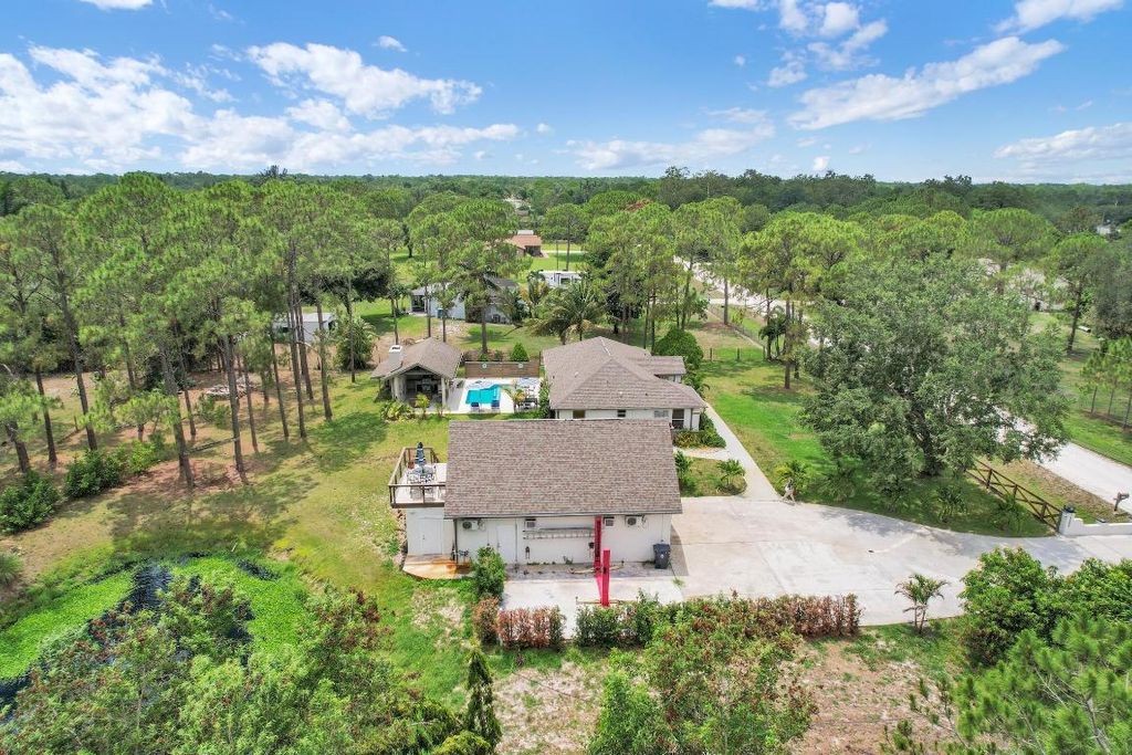 Photo of 14648 88th Place N, Loxahatchee, FL 33470 (MLS # R11094160)