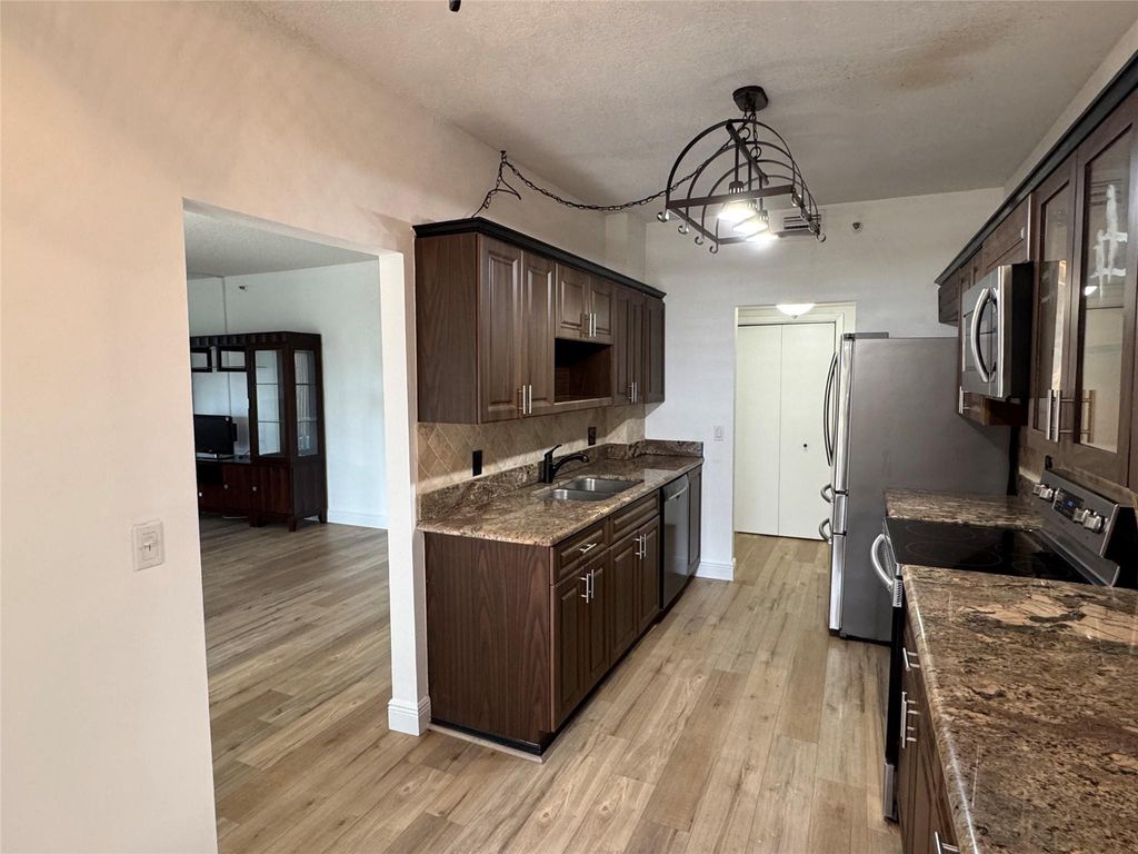 Photo of 3850 Washington Street #102, Hollywood, FL 33021 (MLS # F10554599)