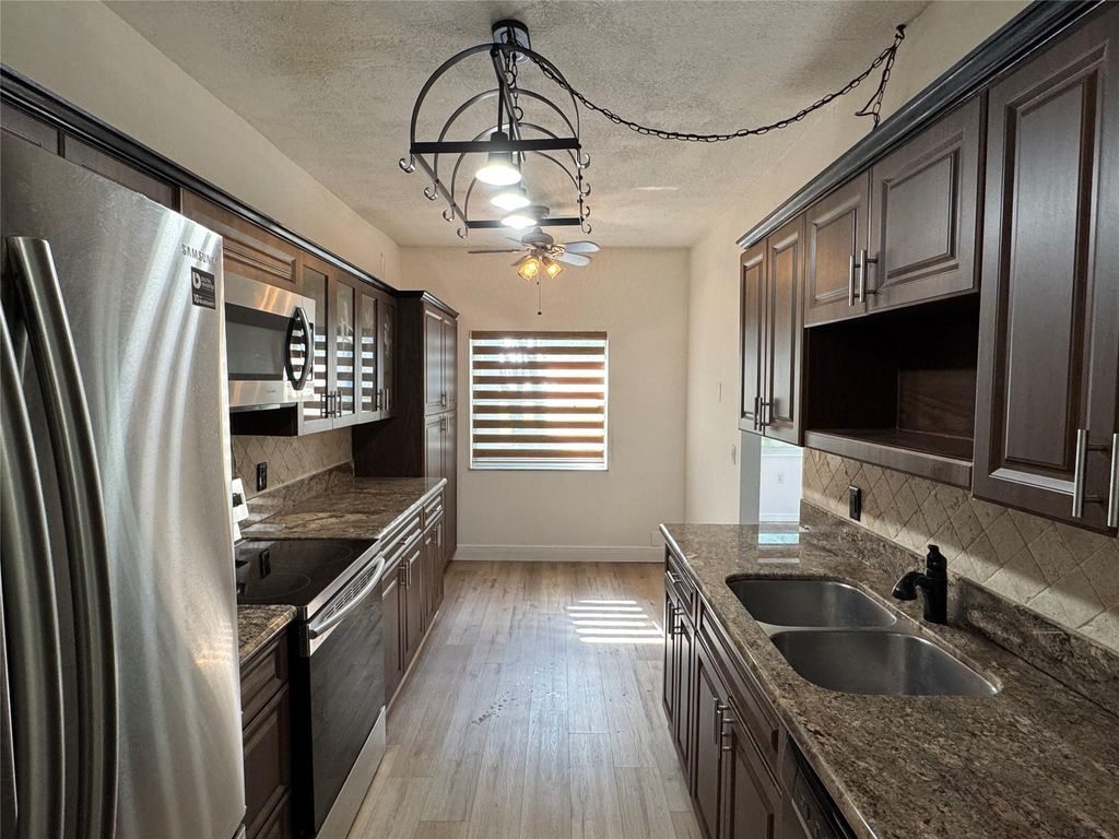 Photo of 3850 Washington Street #102, Hollywood, FL 33021 (MLS # F10554599)