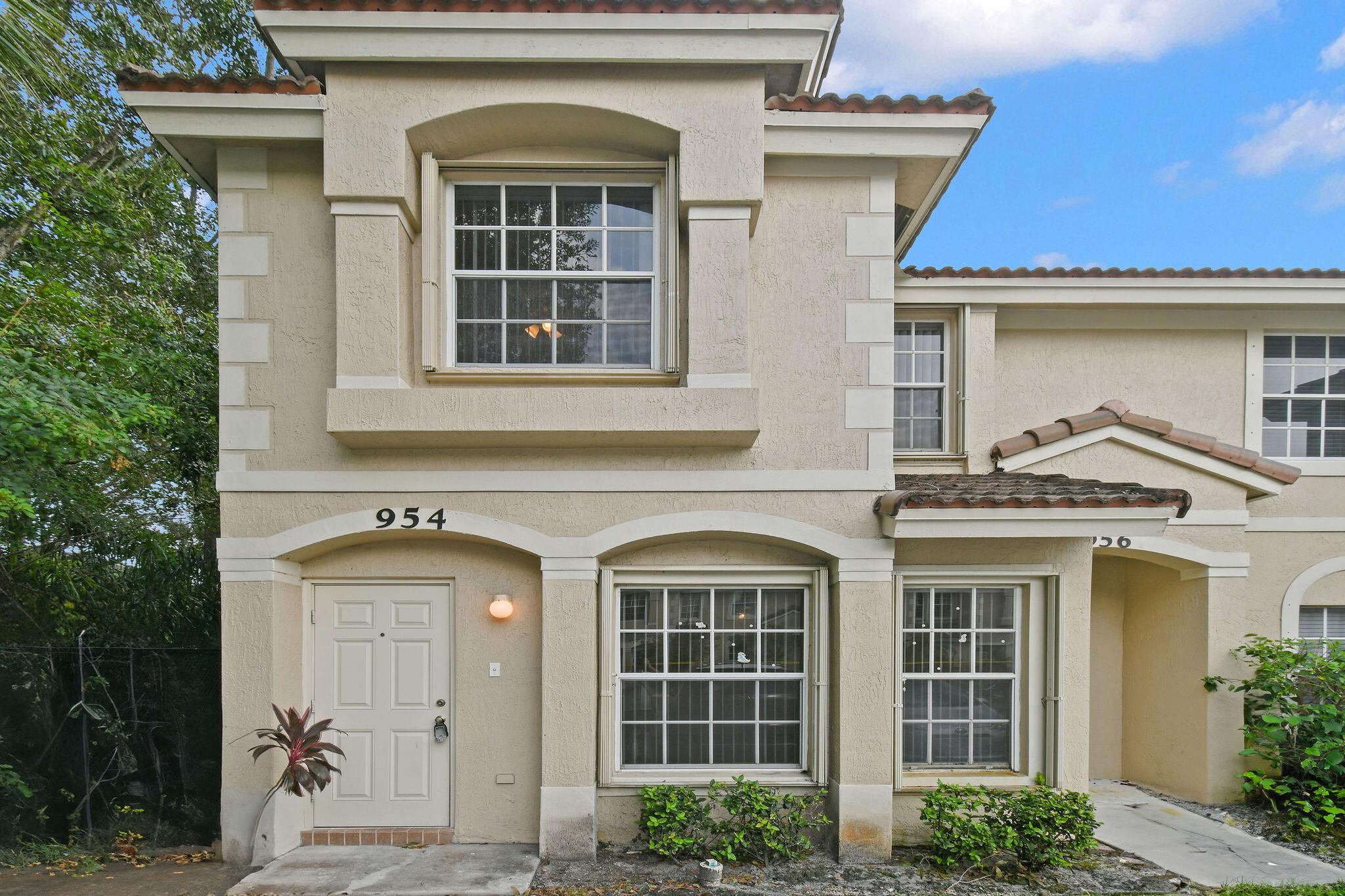 This freshly updated end-unit townhouse feels like new! It features a modern interior with fresh paint, upgraded flooring, and stylish new vanities and mirrors throughout. The remodeled kitchen boasts stainless steel appliances, new fixtures, and sleek ceiling fans.The community offers fantastic amenities, including pools and a playground, perfect for all ages. Conveniently located near I-95, the Turnpike, shopping, and dining, this home provides easy access to everything you need!