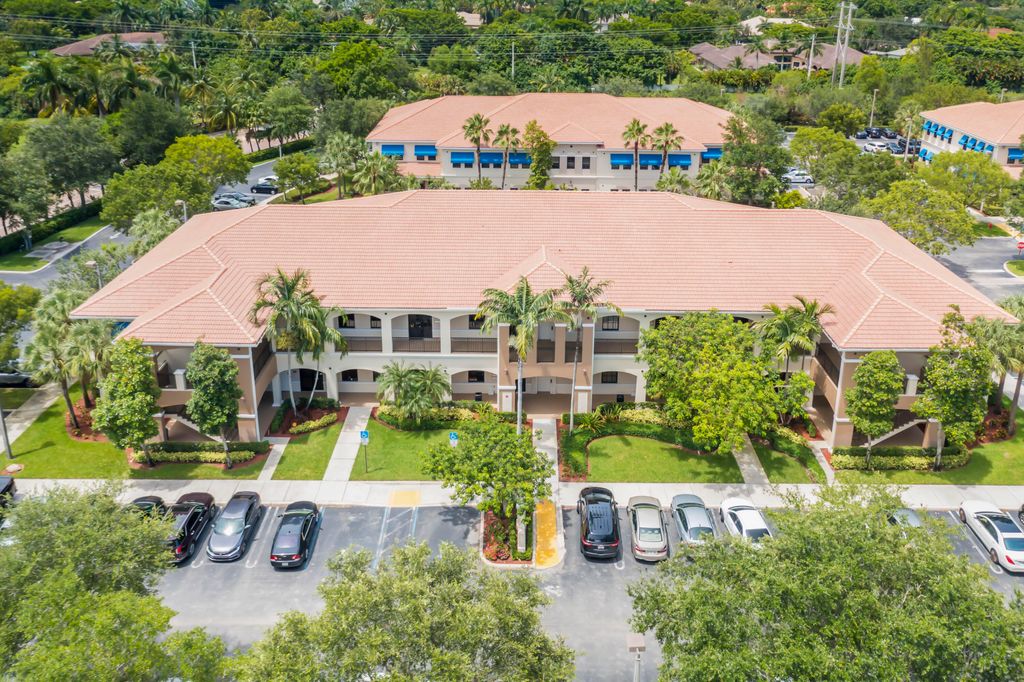Photo of 7501 Wiles Road #207, Coral Springs, FL 33067 (MLS # B26012899)
