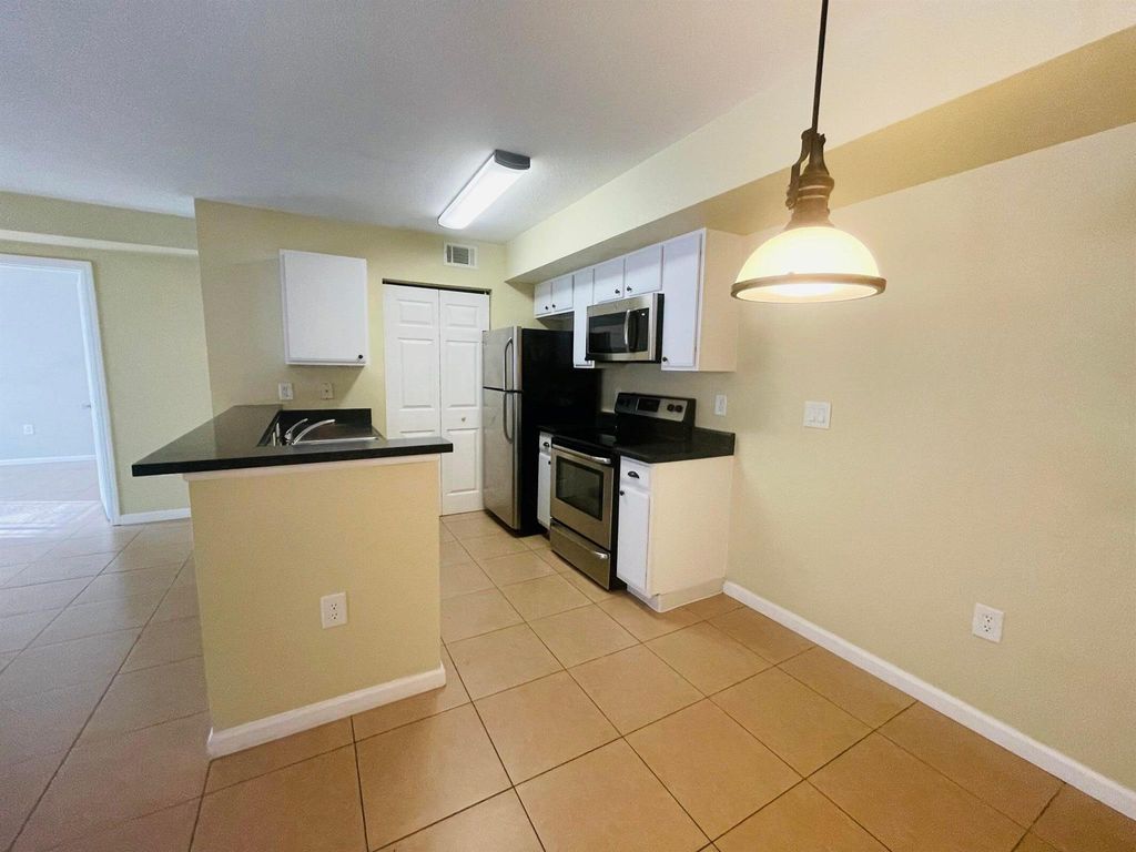 Photo of 151 SW Palm Drive #103, Port Saint Lucie, FL 34986 (MLS # R11077885)