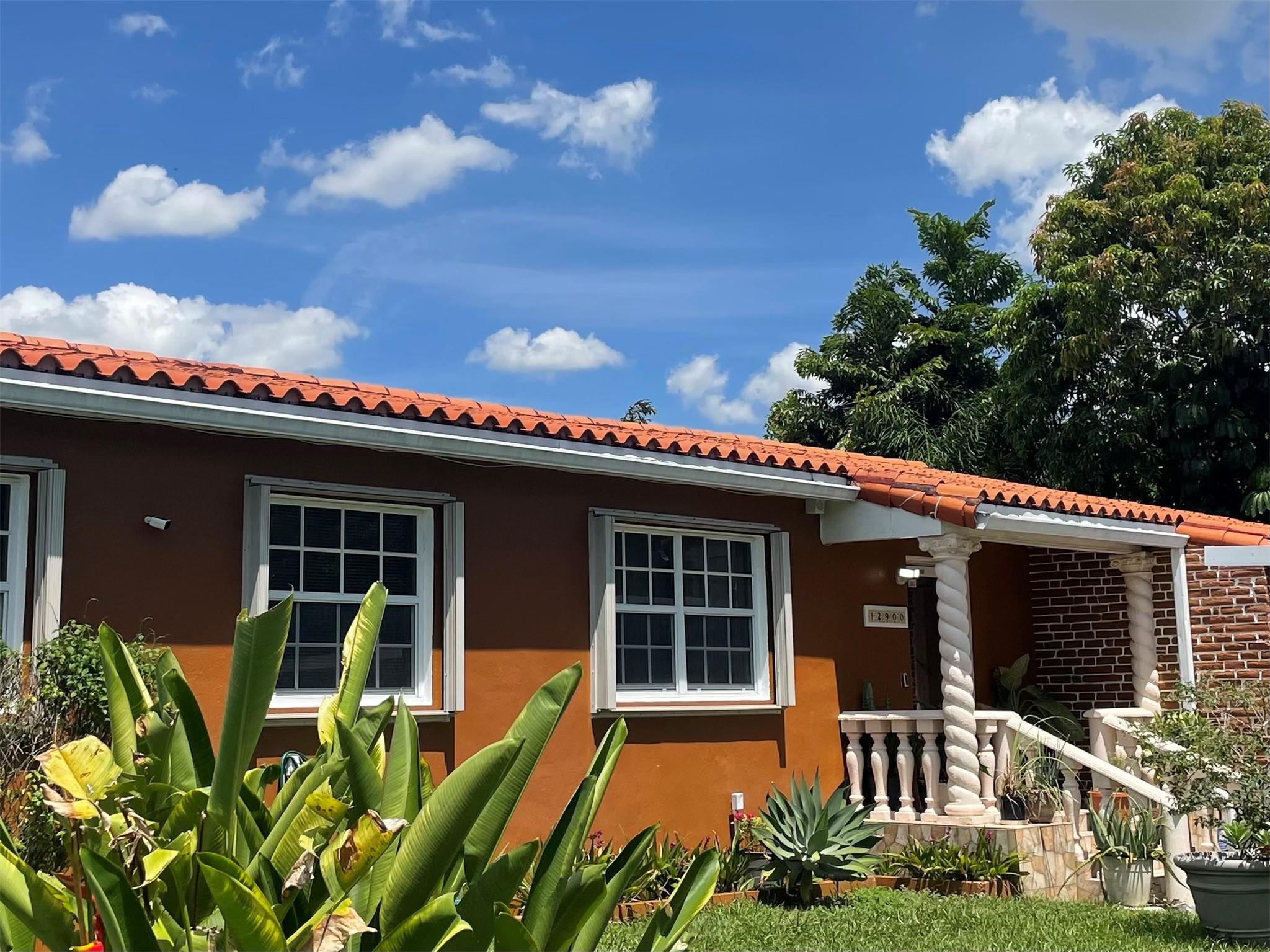Stunning, well-manicured home nestled in the serene vicinity of North Miami. Very conveniently located to most highways and 30 mins from the beach. This stunning split-plan design has been fully remodeled and boasts an airy tropical feel mingled with the exotic charm of the Miami landscape. The main suite has the master bedroom, a cozy sitting area and an extra room that can be utilized as a second bedroom or home office. The remaining 3 rooms are housed together in the main quarters.
The kitchen is a culinary delight: fully upgraded and is a chef's delight. The step-down garage area is enclosed for storage, weight room and so much more. There is a full bathroom in this area as well. The backyard is a gardeners dream - lots of space for partying and fruit trees to enjoy.
A must see!