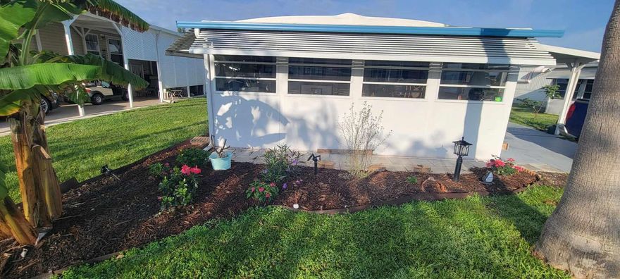 Nicely maintained home in the much sought after Spanish Lakes Community.  Land lease covers all amenities, lawn care, trash removal, taxes and sewer.  Amenities include golf, 2 pools (one heated), shuffleboard, pickleball, bocce, billiards, tennis, community room, party room, game room and much much more.  Dog park coming soon!  Do as much as you like or just sit by the pool and relax.  Future residents must be approved by Spanish Lakes.  Please call for application.
