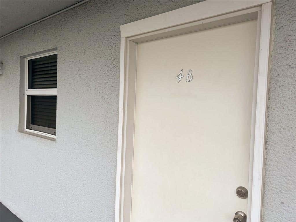 Photo of 115 Royal Park Dr #4B, Oakland Park, FL 33309 (MLS # F10383841)