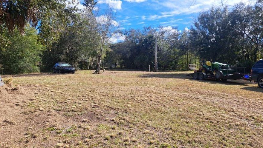 Country living. NW Okeechobee County, Weekend getaway or build your dream home Culvert, gated entrance, DRY LOT ! Outdoor Kitchen. 14x36 paver patio.  WELL and ELECTRIC on property. 4 paver patios for 4  RV hookups ,(all with electric & water). Beautiful lot on dead end street. NO HOA. zoned residential/agricultural