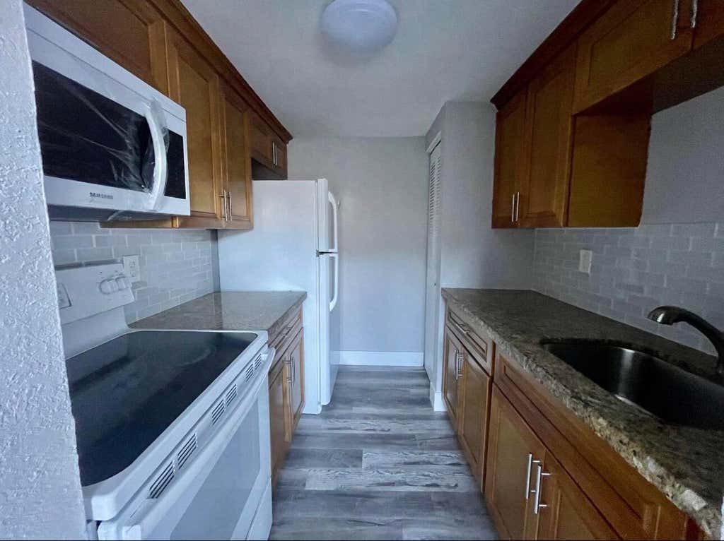 Photo of 2110 Sherwood Forest Boulevard #24, West Palm Beach, FL 33415 (MLS # B26057401)
