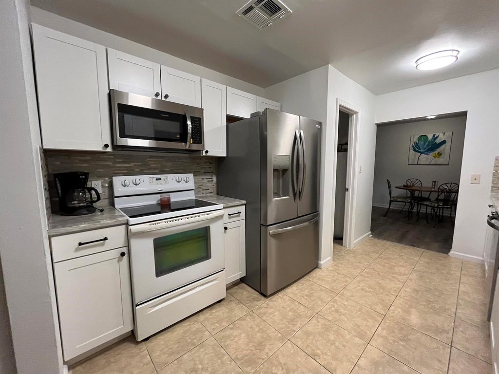 Photo of 1332 SW 28th Street, Palm City, FL 34990 (MLS # R11099627)