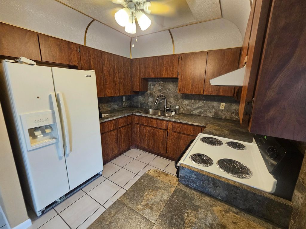 Photo of 903 NW Spruce Ridge Drive #4, Stuart, FL 34994 (MLS # B26021731)