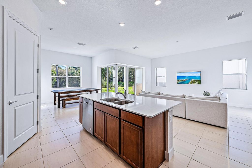 Photo of 9775 SW Meridian Way, Stuart, FL 34997 (MLS # B26036931)