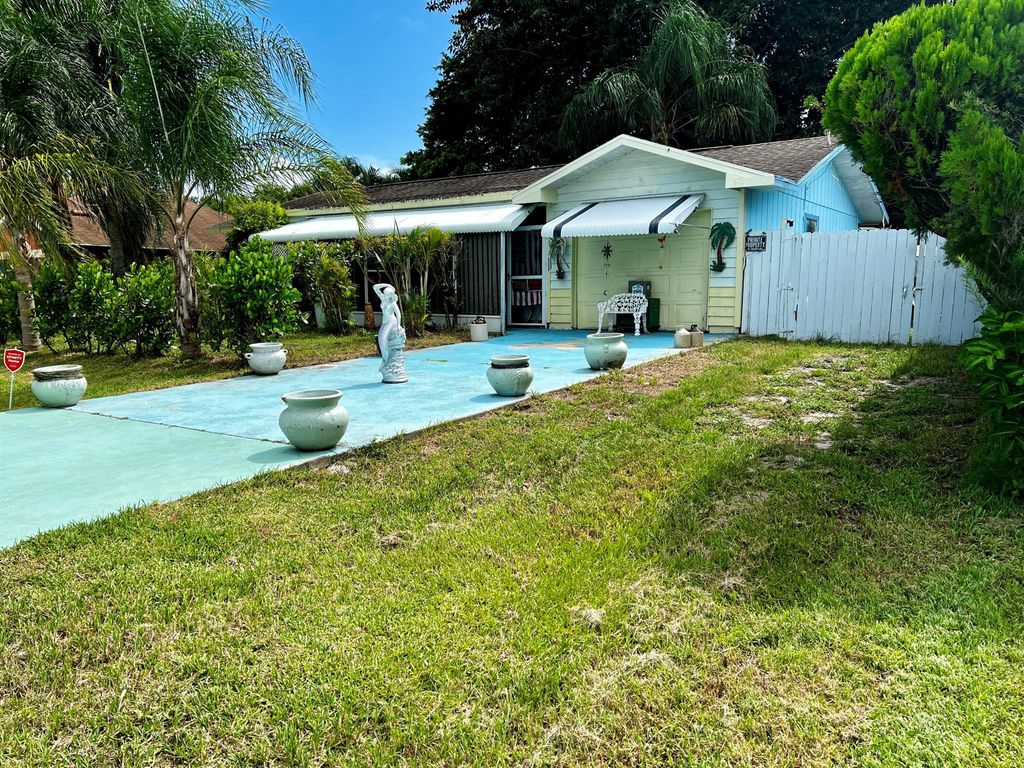 Photo of 1834 SE Bowie Street, Port Saint Lucie, FL 34952 (MLS # R11009502)