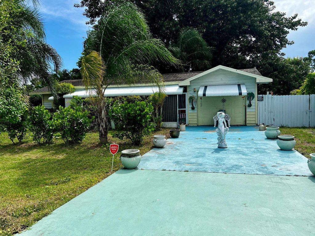 Photo of 1834 SE Bowie Street, Port Saint Lucie, FL 34952 (MLS # R11009502)