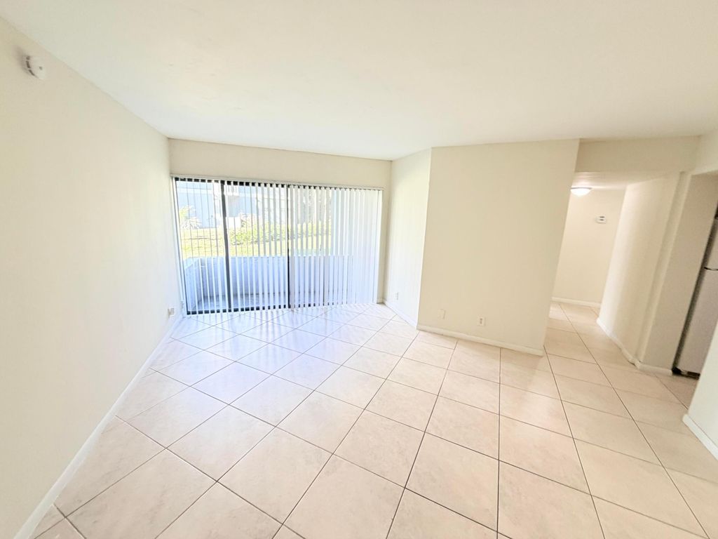 Photo of 1820 N Congress Ave #103, West Palm Beach, FL 33401 (MLS # B26000995)