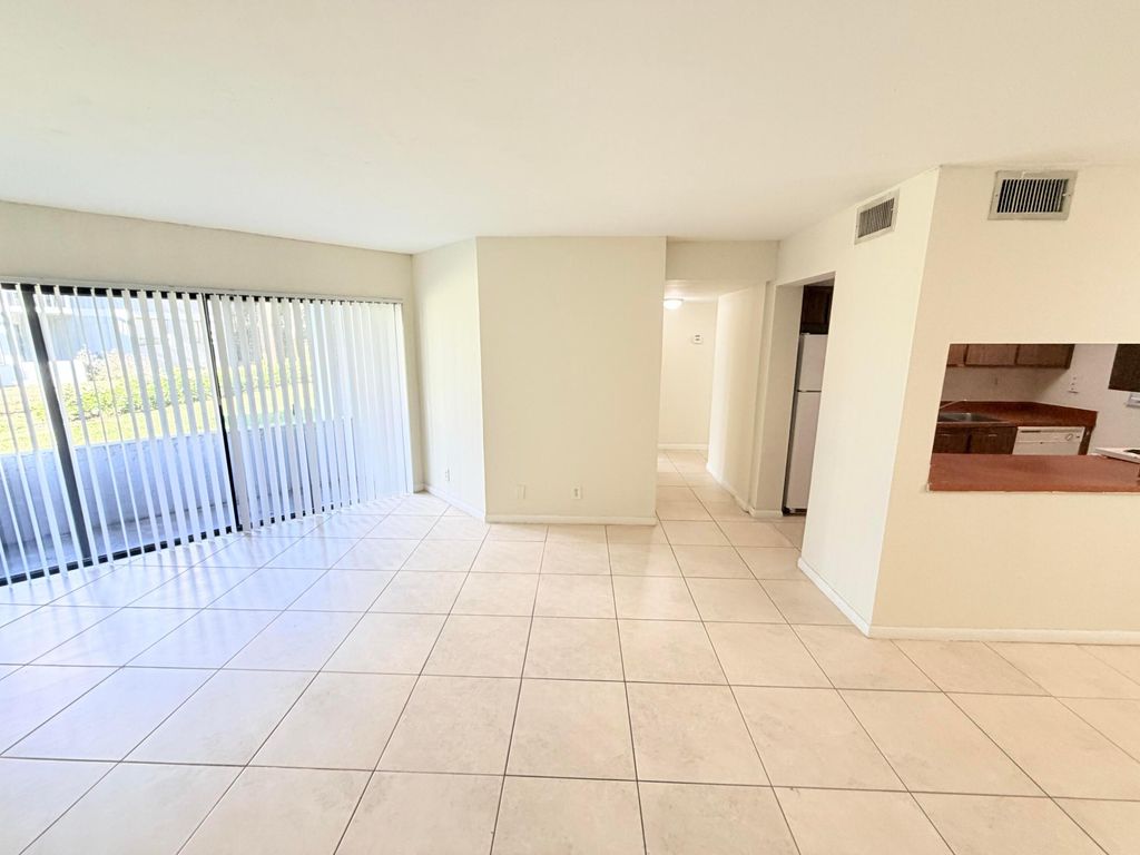 Photo of 1820 N Congress Ave #103, West Palm Beach, FL 33401 (MLS # B26000995)