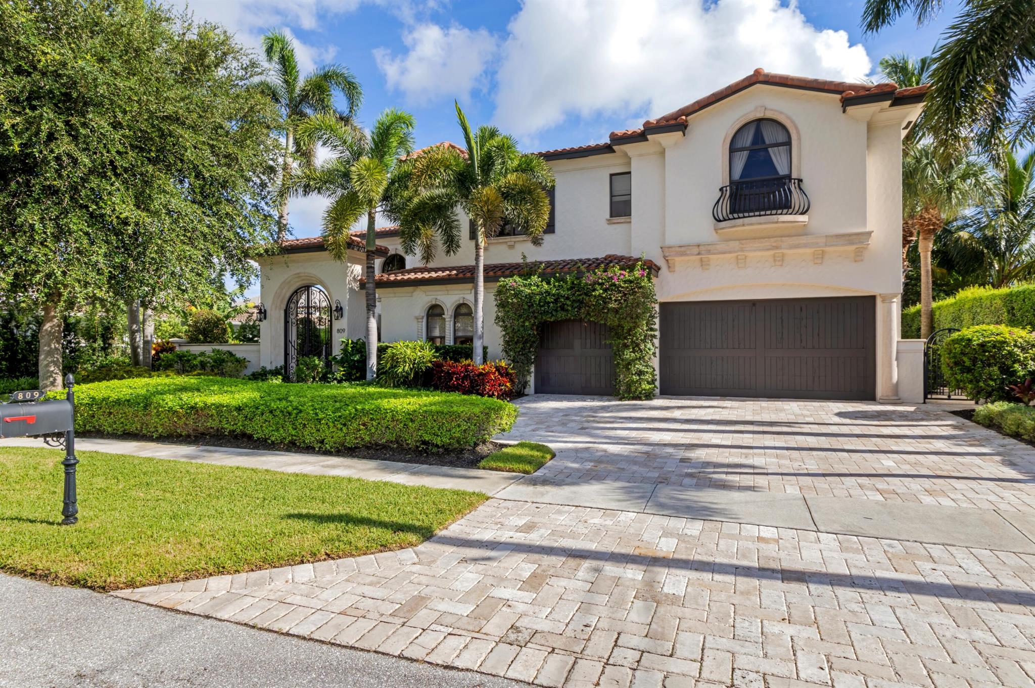 Welcome to your exquisite new residence, where luxury meets elegance. This meticulously maintained home is a must-see for any discerning buyer.Nestled on approximately 83 feet of waterfront in the prestigious Boca Harbour of Boca Raton, this Mediterranean estate offers direct ocean access without any fixed bridges.Spanning approximately 5,336 square feet, this stunning four-bedroom home features a breathtaking domed foyer with soaring 22-foot ceilings that flow into the spacious living room. The light-filled living area boasts floor-to-ceiling windows and a magnificent marble fireplace, seamlessly connecting to the separate dining room with picturesque water views.