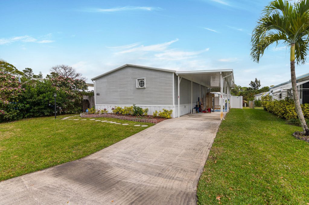 Photo of 7955 SE Wren Avenue, Hobe Sound, FL 33455 (MLS # R10776404)
