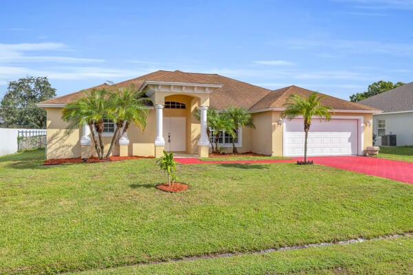 Photo of 729 SW Sardinia Avenue, Port Saint Lucie, FL 34953 (MLS # R11147864)