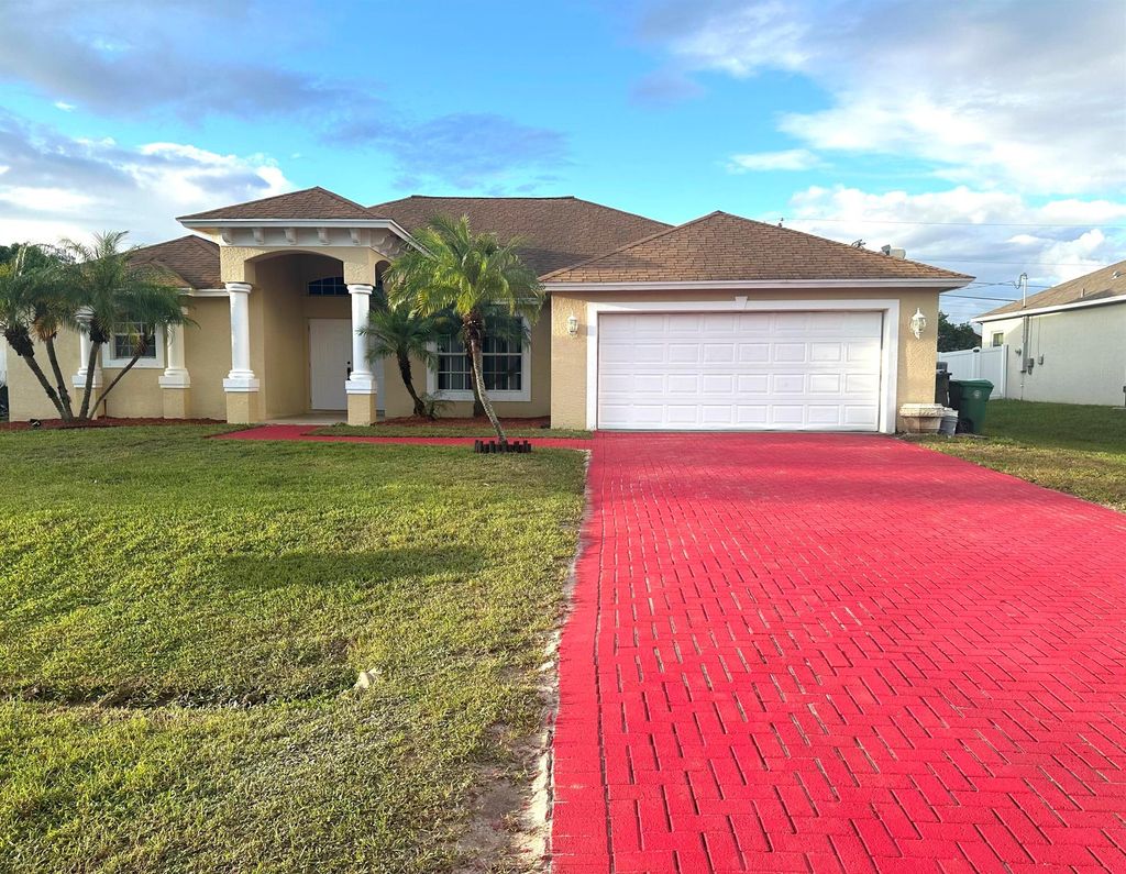 Photo of 729 SW Sardinia Avenue, Port Saint Lucie, FL 34953 (MLS # R11147864)