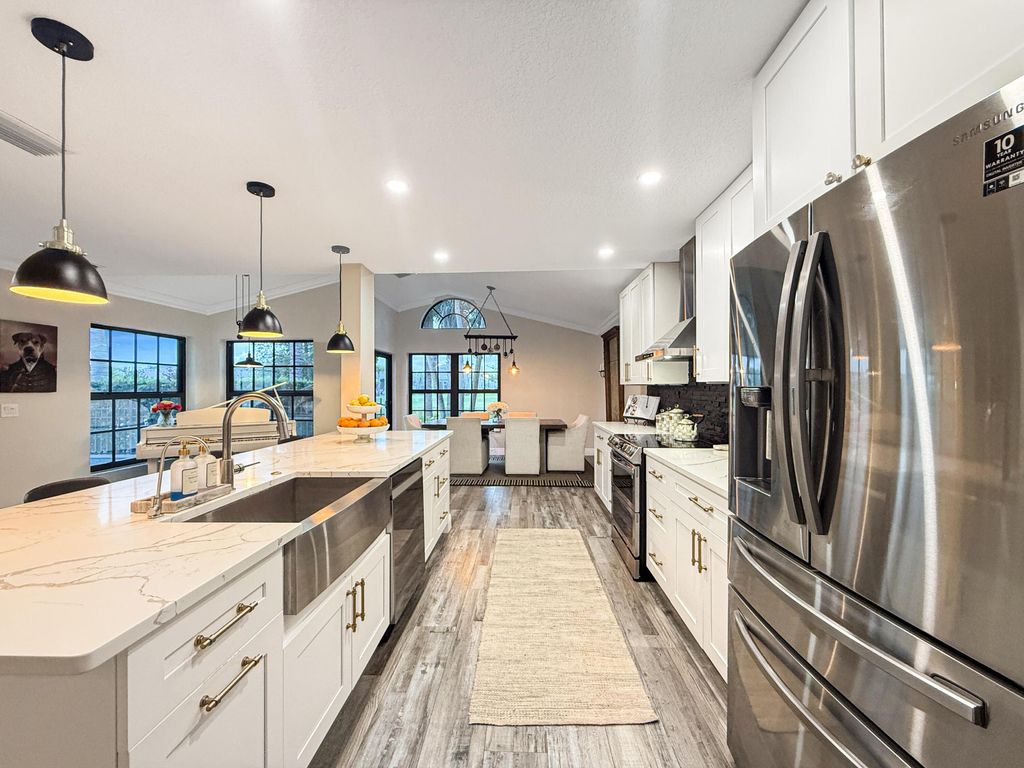 Photo of 240 Sherwood Forest Drive, Delray Beach, FL 33445 (MLS # B26036437)