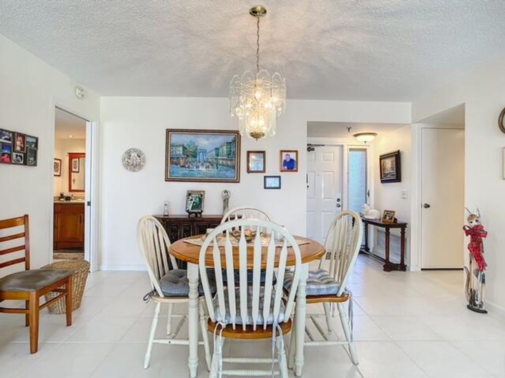 Photo of 5390 Woodland Lakes Drive #105, Palm Beach Gardens, FL 33418 (MLS # R10950513)
