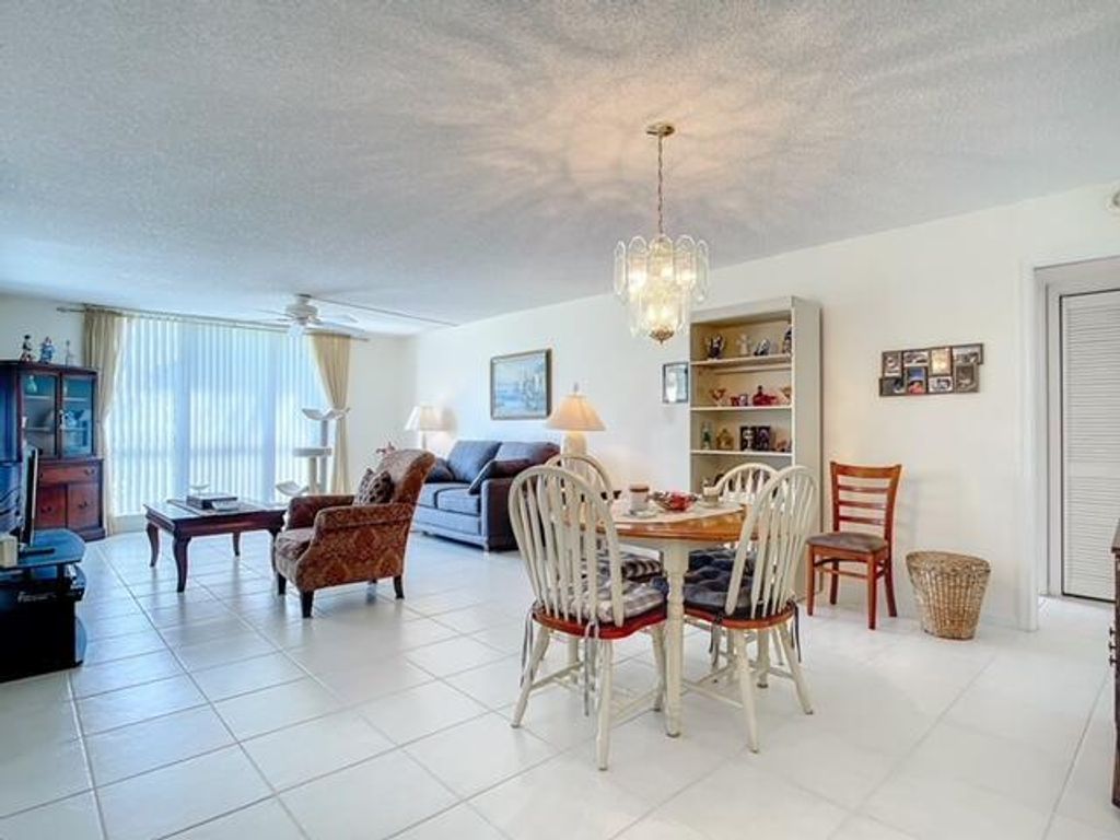 Photo of 5390 Woodland Lakes Drive #105, Palm Beach Gardens, FL 33418 (MLS # R10950513)