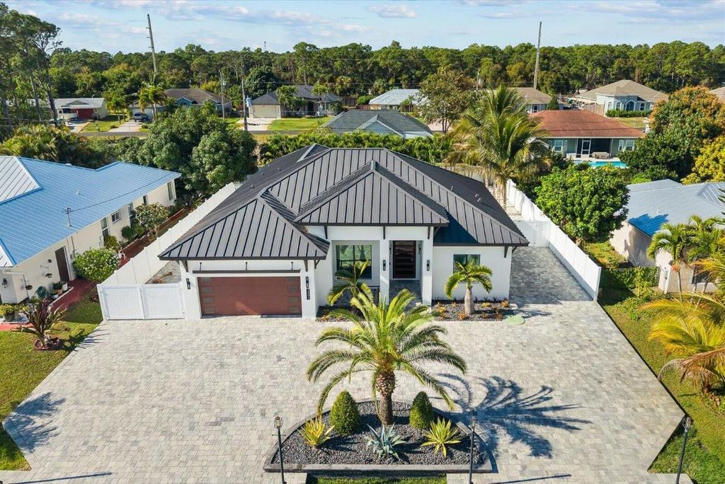 Photo of 3291 SE West Snow Road, Port Saint Lucie, FL 34984 (MLS # R11149393)