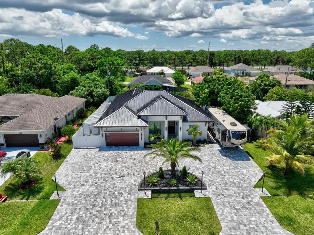 Photo of 3291 SE West Snow Road, Port Saint Lucie, FL 34984 (MLS # R11149393)