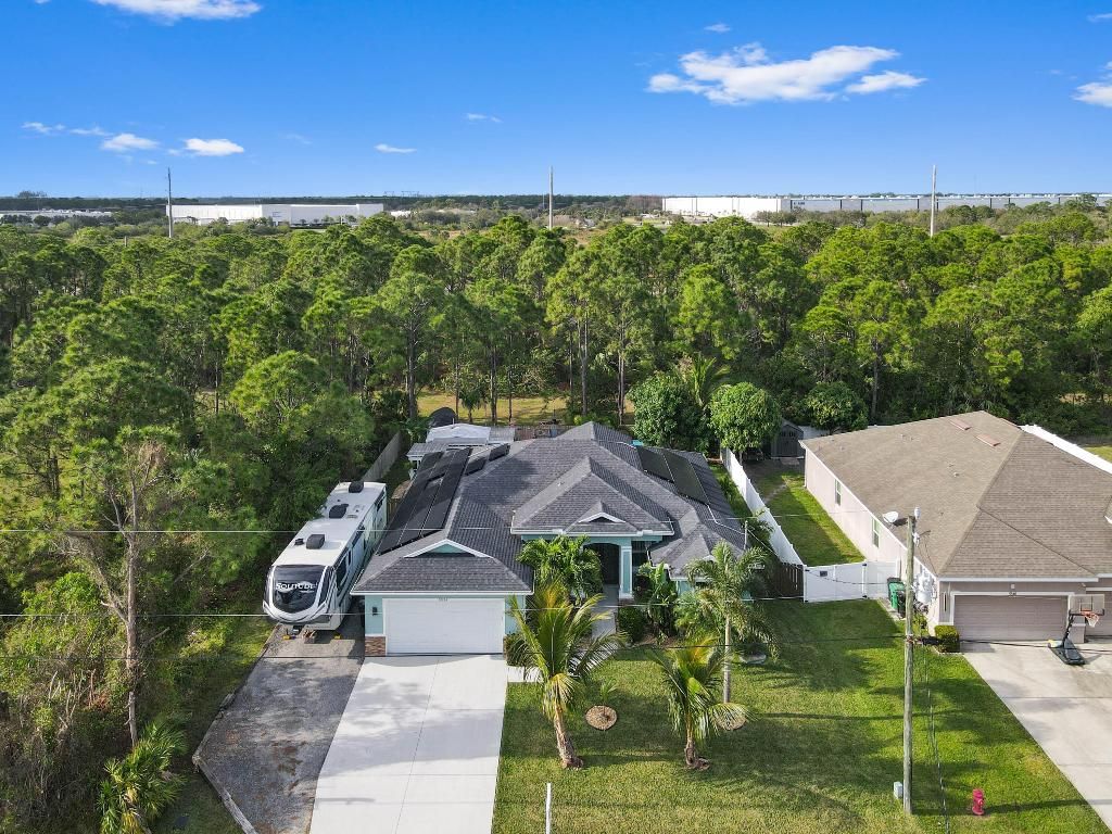 Photo of 5538 NW Cordrey Street, Port Saint Lucie, FL 34986 (MLS # R11050071)