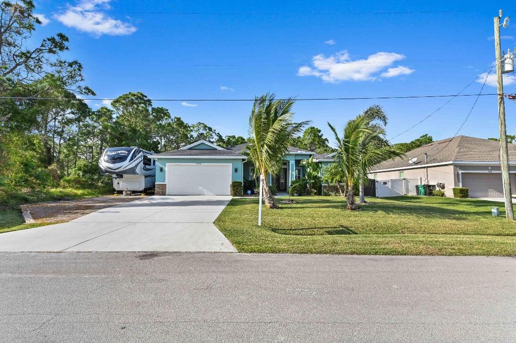 Photo of 5538 NW Cordrey Street, Port Saint Lucie, FL 34986 (MLS # R11050071)
