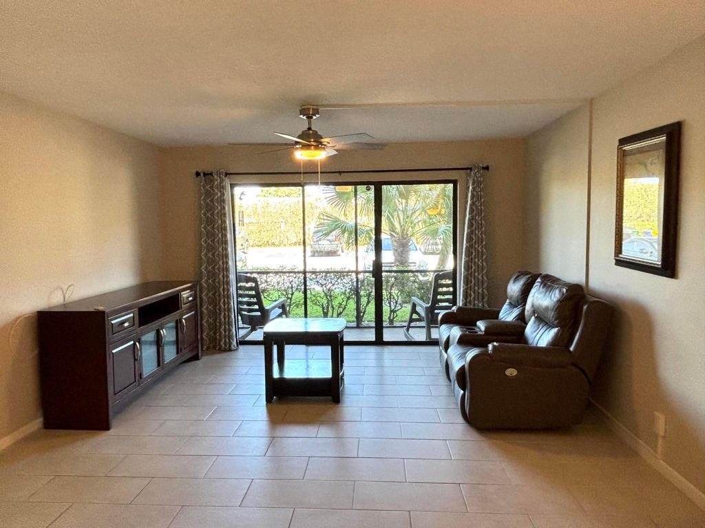 Photo of 617 Sea Pine Way #D1, Greenacres, FL 33415 (MLS # R11141815)