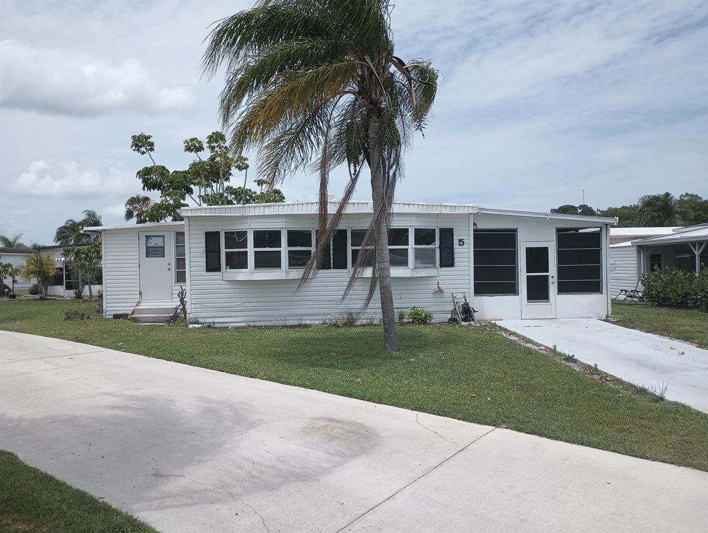 Photo of 5 Santa Fe Lane, Port Saint Lucie, FL 34952 (MLS # R11101285)