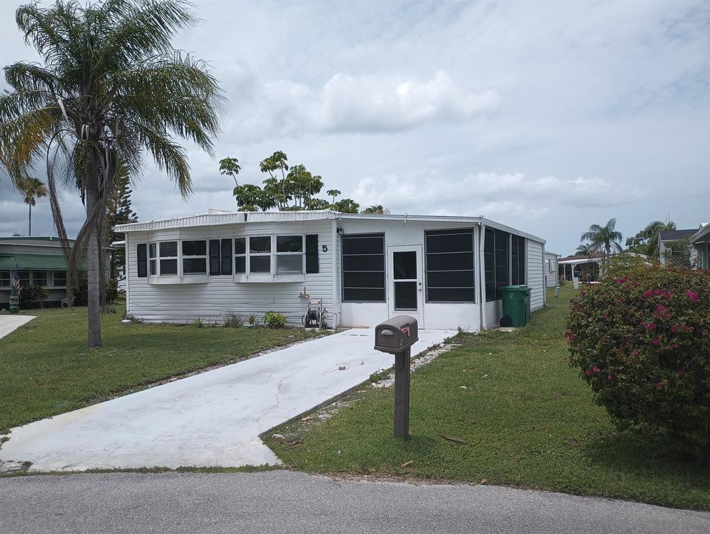 Photo of 5 Santa Fe Lane, Port Saint Lucie, FL 34952 (MLS # R11101285)