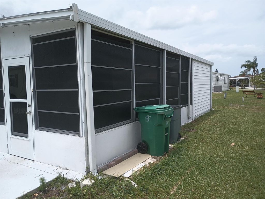 Photo of 5 Santa Fe Lane, Port Saint Lucie, FL 34952 (MLS # R11101285)