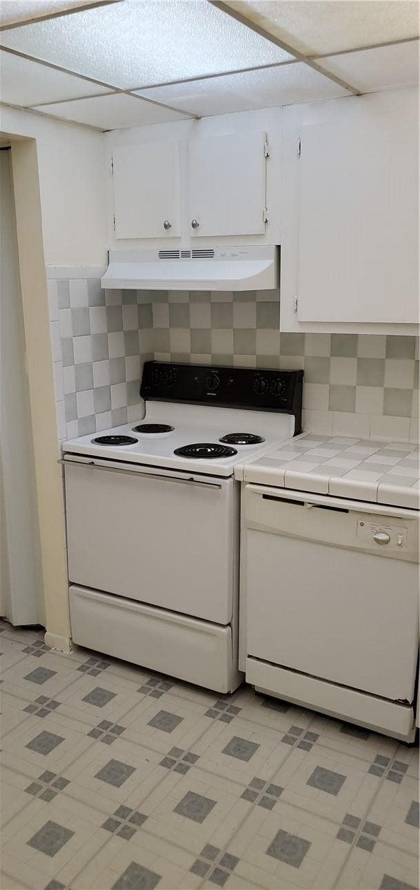 Photo of 7900 FAIRVIEW Drive #206, Tamarac, FL 33321 (MLS # B26062607)