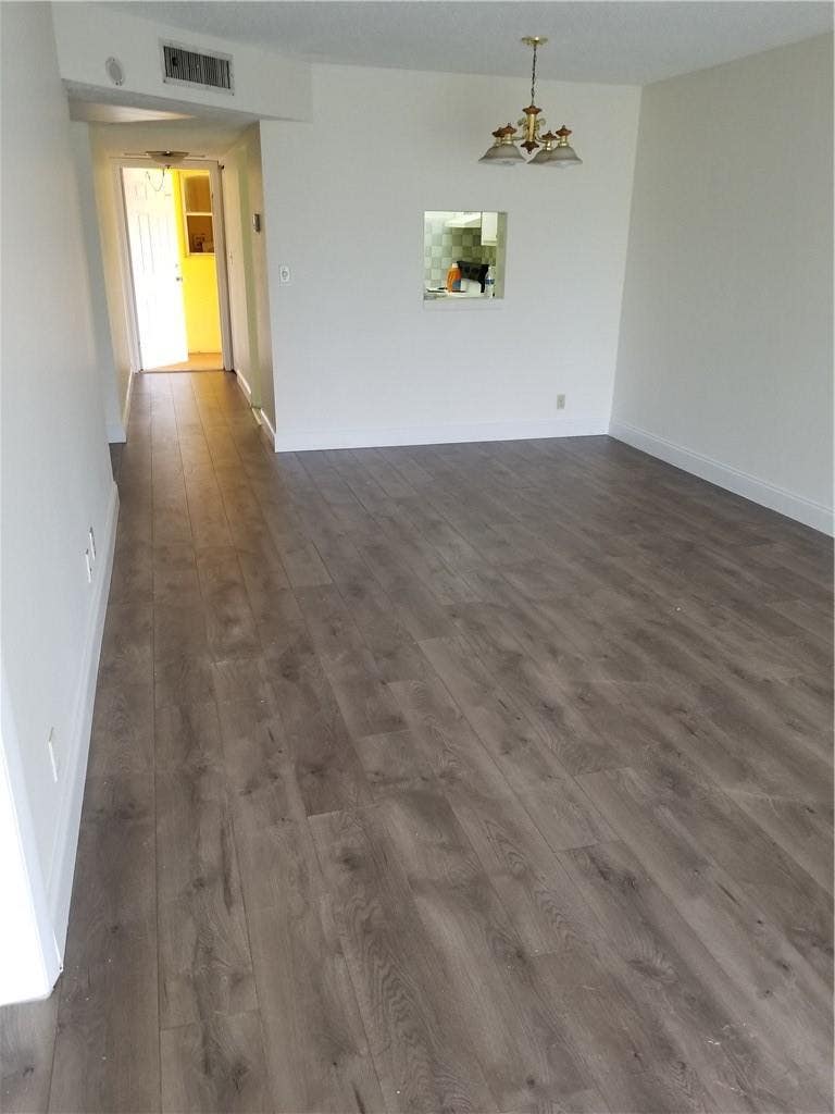 Photo of 7900 FAIRVIEW Drive #206, Tamarac, FL 33321 (MLS # B26062607)