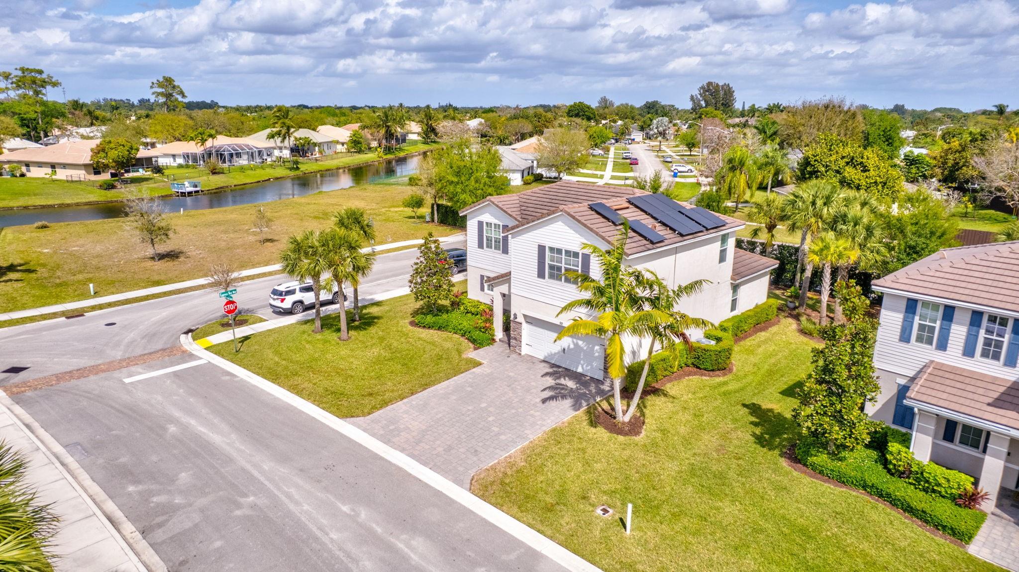 Impeccable 4-Bed + Loft in Royal Palm Beach – Built in 2018, this rarely available single-family home offers the perfect blend of modern comfort & convenience. Featuring a spacious loft, the open layout includes a first-floor primary suite, impact glass & a upgraded kitchen with premium cabinetry, SS appliances, and porcelain tile flooring. Energy-efficient living with solar panels + EV charger (saving hundreds a month) - community clubhouse, fitness center, resort-style pool, and scenic paths. Lawn care, WiFi, & cable included - Located moments from Wellington’s world-class dining, shopping, and equestrian lifestyle. Assumable loan at 2.875% for qualified buyers. *All measurements are approx. & should be verified by buyer or buyer’s agent. Info deemed reliable but not guaranteed.*