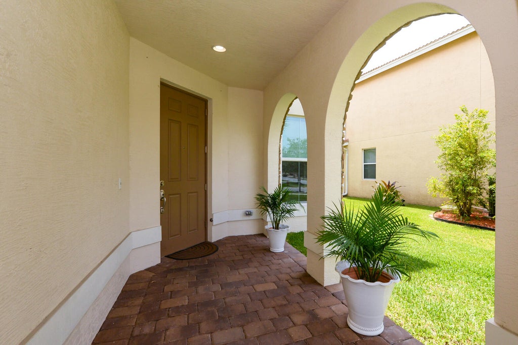 Photo of 713 NW Leonardo Circle #713, Port Saint Lucie, FL 34986 (MLS # B26048520)