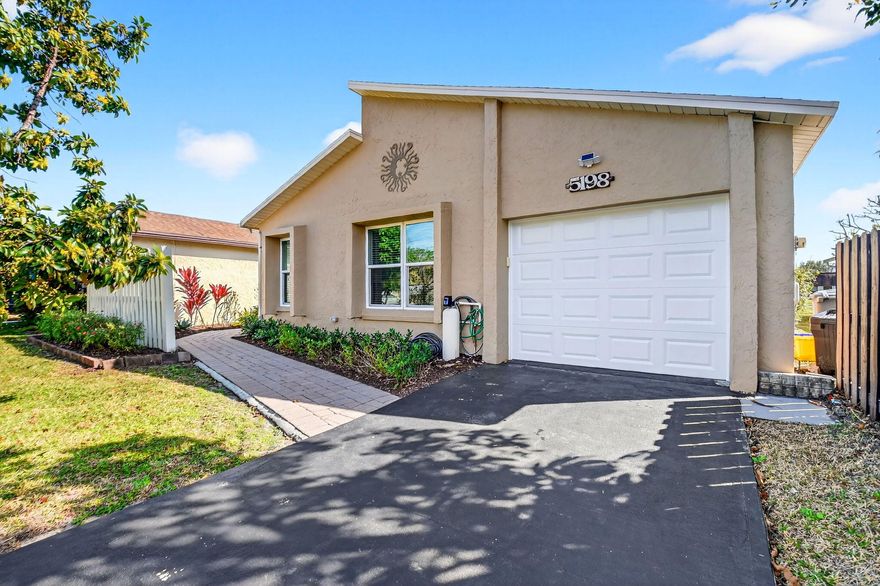 Beautifully updated lakefront home in the desirable community of Mirror Lakes! This move-in ready 2-bedroom, 2-bath residence offers the perfect blend of comfort and Florida charm.  The renovated kitchen features white shaker cabinetry, granite countertops, 2025 stainless appliances, and a cozy eat-in area.  Both bathrooms are tastefully updated for modern living. The bright Florida room overlooks the lake and is ideal for a home office, sitting area, or peaceful retreat. Hurricane Windows and Newer Air Conditioner add to your peace of mind Enjoy outdoor entertaining on the patio, perfect for BBQs with friends and family. Sip your morning coffee under the mango tree while watching serene lake views and local wildlife.  Mirror Lakes is an Friendly adult community with a low Monthly HOA Fee. It is conveniently located near shopping, dining, airports, and I-95