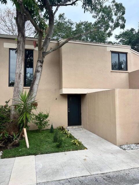 Completely renovated 2 bedroom and 1 & half bath townhouse, which has a screened and covered patio and a balcony. New impact windows & doors all around, new kitchen, new appliances, new washer & dryer inside, new A/C, new waterproof laminate flooring, and new Roof. Central to A rated schools, FAU, Mizner Park, restaurants shopping, beach, hospital, I-95. Community has a beautiful pool, clubhouse and tennis court.