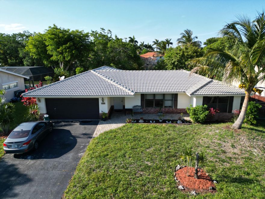 Welcome to 8753 NW 27th Street, a rare opportunity in the heart of desirable Coral Springs. This spacious 4 bedroom, 2 bath pool home with a 2 car garage sits on a canal lot and offers incredible potential for buyers with vision. Inside, you'll find oversized living spaces and a functional layout ready to be transformed into your dream home. Step outside to a private backyard featuring a pool, waterfront views, and plenty of space to create the ultimate outdoor retreat. With solid bones, no HOA, and a prime location near top rated schools, parks, shopping, dining, and major roadways, this home is packed with opportunity and upside. Bring your imagination and make this Coral Springs gem your own before it's gone.