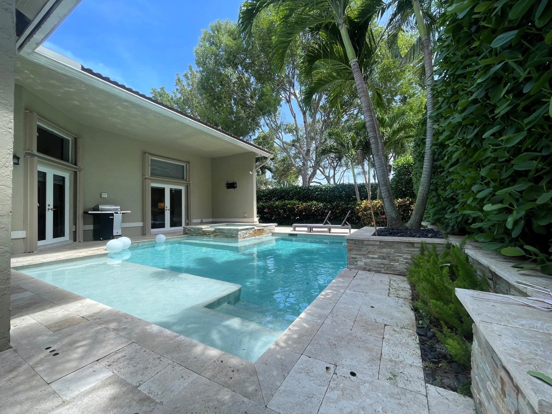 Nestled in sought after Turtle Run Estates, this extraordinary corner lot residence is where contemporary elegance meets timeless comfort. Throughout the home, the 10” x 72” matte rectified porcelain flooring creates a seamless, sophisticated flow. The gourmet kitchen is a culinary enthusiast’s dream, fully equipped with wireless & touchless technology, centered around a stunning quartz waterfall island. Thoughtfully designed interiors feature travertine accent walls with custom built-in shelving, electric fireplaces, wet bar fridge & ambient LED lighting. The home boasts three spa-inspired baths, each with floating vanities & Italian porcelain accent walls. Outdoors, the residence continues to impress with a resort-style pool & spa. Luxury homes of this caliber are exceptionally rare.