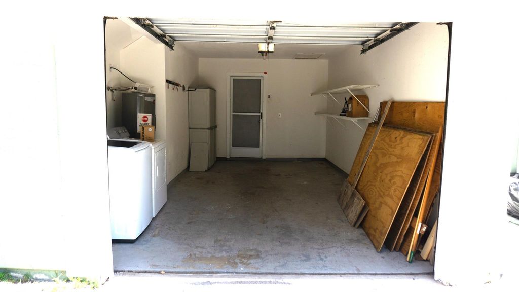 Photo of 1450 SE Rivergreen Circle, Port Saint Lucie, FL 34952 (MLS # R11087055)