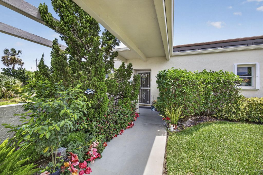 Photo of 2651 Boundbrook Boulevard, West Palm Beach, FL 33406 (MLS # B26028840)