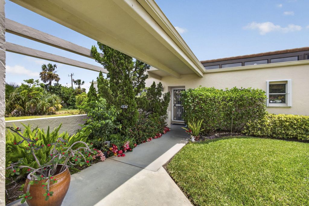 Photo of 2651 Boundbrook Boulevard, West Palm Beach, FL 33406 (MLS # B26028840)