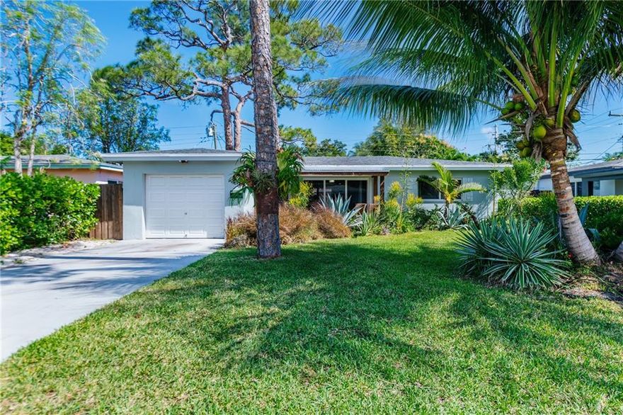 Proudly presenting North Andrews Gardens newest three bedroom one bathroom! Take advantage of this bright spacious floor plan featuring an expandable kitchen with white cabinetry, black quartz counter tops, glass back splash, updated bathroom,  central A/C (2017),  impact glass, newer roof (2018), updated plumbing / electrical, fenced yard, out door shower and room for a pool! The third bedroom is a garage conversion with impact rated door. Square footage larger than shown on tax roll. Located in hight desirable North Andrews Gardens.