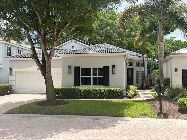 THIS SENSATIONAL HOME HAS BEEN RNEOVATED TO THE HIGHEST STANDARD. EVERYTHING IS 1 YEAR OLD AND REFLECTS THE OWNERS IMPECCABLE SENSE OF STYLE. AN IDEAL VACATION HOME IN PARADISE WITH 2 BEDROOMS PLUS A DRESSING ROOM DESK AREA, 2 FULL KNOCKOUT BATHS. FEATURES INCLUDE SPACIOUS OPEN FLOOR PLAN, STUNNING KITCHEN WITH HIGH END APPLIANCES, BREAKFAST AREA AND ENORMOUS CENTER ISLAND, OUTSIDE LIVING AREA INCLUDES LARGE PAVER STONE PATIO, SEATING AND DINING AREAS AND LOVELY PRIVATE GARDEN VIEWS. OUTFITTED WITH EVERY POSSIBLE CONVENIENCE. ENJOY THE FABULOUS CLUBHOUSE AND ALL BALLENISLES AMENITIES INCLUDING 5 DINING VENUES, SPORTS CENTER, SOCIAL EVENTS, TENNIS, PICKLEBALL AND GOLF (WITH A SPORTS MEMBERSHIP UPGRADE OF $581/MO). GOLF CART INCLUDED..