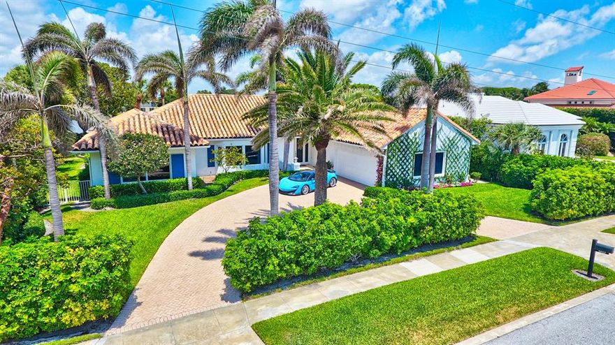 Classic Bermuda style home with panoramic views of Manatee Cove in the highly sought after enclave of Point Manalapan . This stately home with almost 4000sf of living space offers generous room sizes, high ceilings and a bright, open floor plan that lends itself to easy entertaining. All en suite bedrooms with large baths, cabana bath & walk-in closets. With 110' of water frontage, enjoy expansive views from living areas and master bedroom. Gorgeous backyard and pool area with large lanai. Easy access by boat to the Intracoastal and just minutes to the ocean inlet. Property offers privacy and seclusion located on a cul-de-sac street and manned entrance to the community. Gratis membership to La Coquille Club at the Eau Resort. Manalapan is a truly unique town of unparalleled beauty.