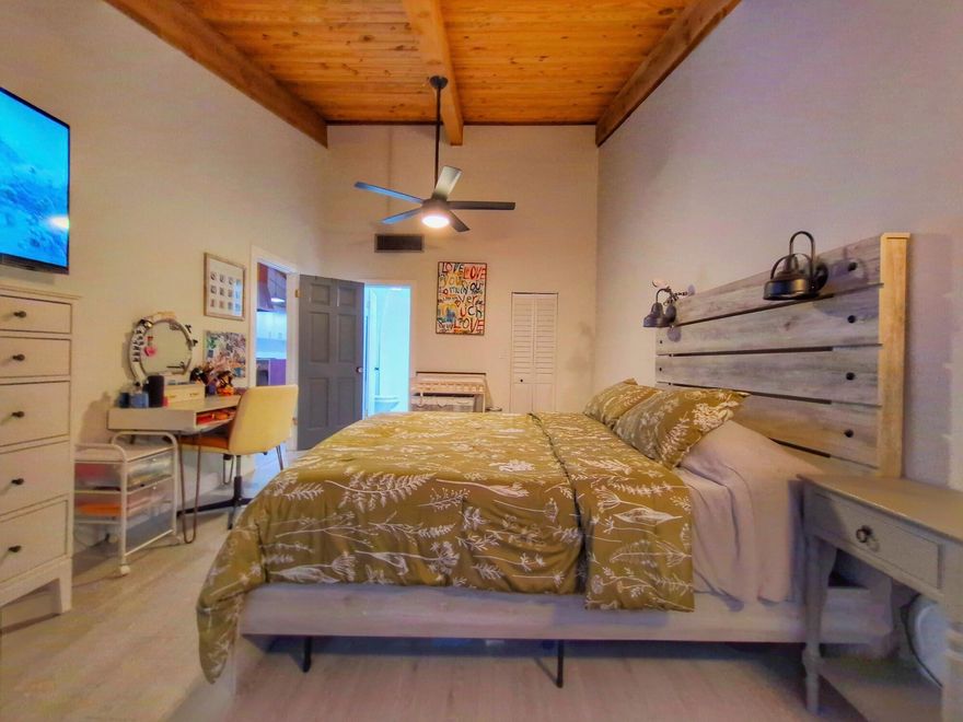 Welcome to Paradise. Beautifully updated 2-bedroom, 2-bath home in the sought-after Cedarwoods community of Pembroke Pines. This home features an open layout, a cozy loft space perfect for a home office, guest area, or creative retreat, & walk-in closets in both bedrooms. Enjoy a modern kitchen with custom-built cabinets, full backsplash, & all-new 2023 appliances, along with updated bathrooms, flooring, lighting. The main bathroom boasts a renovated walk-in shower, quartz vanity, & vessel sink, while the guest bathroom includes a quartzite vanity. French doors, epoxy flooring in the kitchen & dining area, a pergola in the backyard, & vaulted ceilings that create a bright, open, & airy atmosphere. 2 parking spaces in front of unit. Low HOA of $124/mo. Accordion shutters throughout.